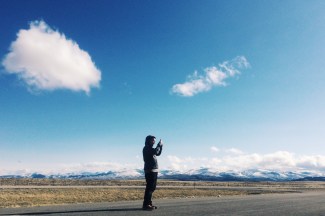 Kolby Kickingwoman stops to capture the view on the Blackfeet Indian Reservation, where he was reporting a story that placed 17th in the Hearst Journalism Awards.