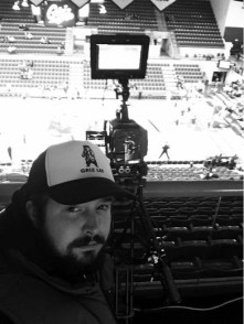 Detrick sports a Griz Lee hat and gets ready for a Griz basketball game on December 22nd, 2015, as part of Griz Vision.