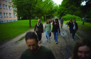 photo shows MT journalism students walking down a sidewalk.