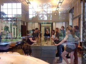 Missoula to Berlin members and Dean Larry Abramson listen to tour guide Alischia Kusche in Berlin. Photo by Sachi Sinhara.